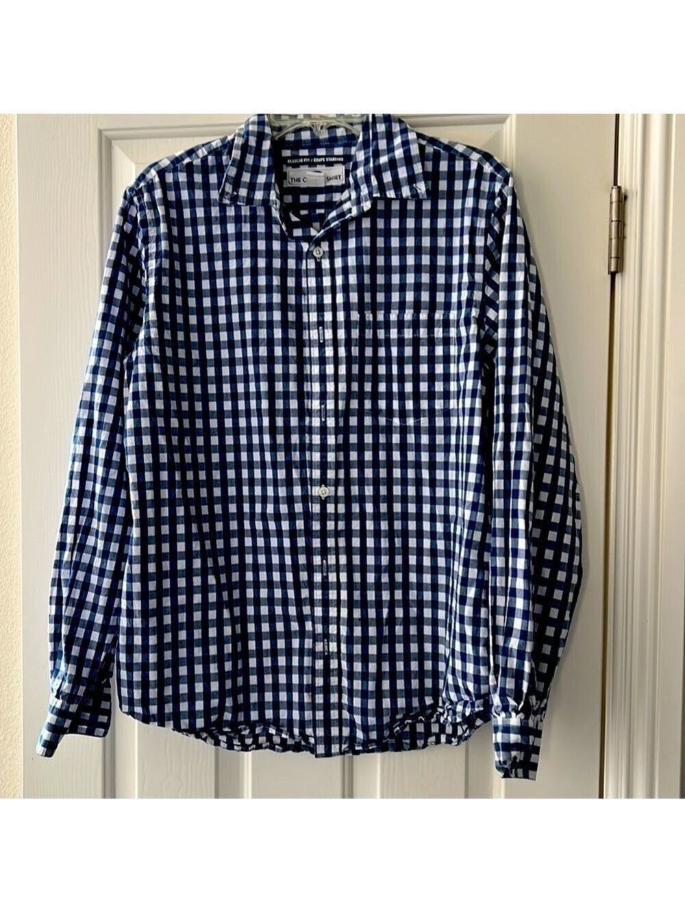 Men’s Old Navy blue and white plaid button up shirt.
